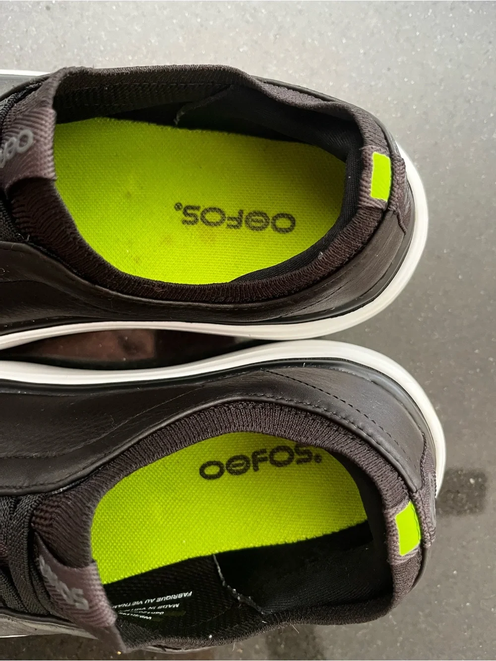 OOFOS Black Slip-On Loafers with White Sole and Neon Green Tab